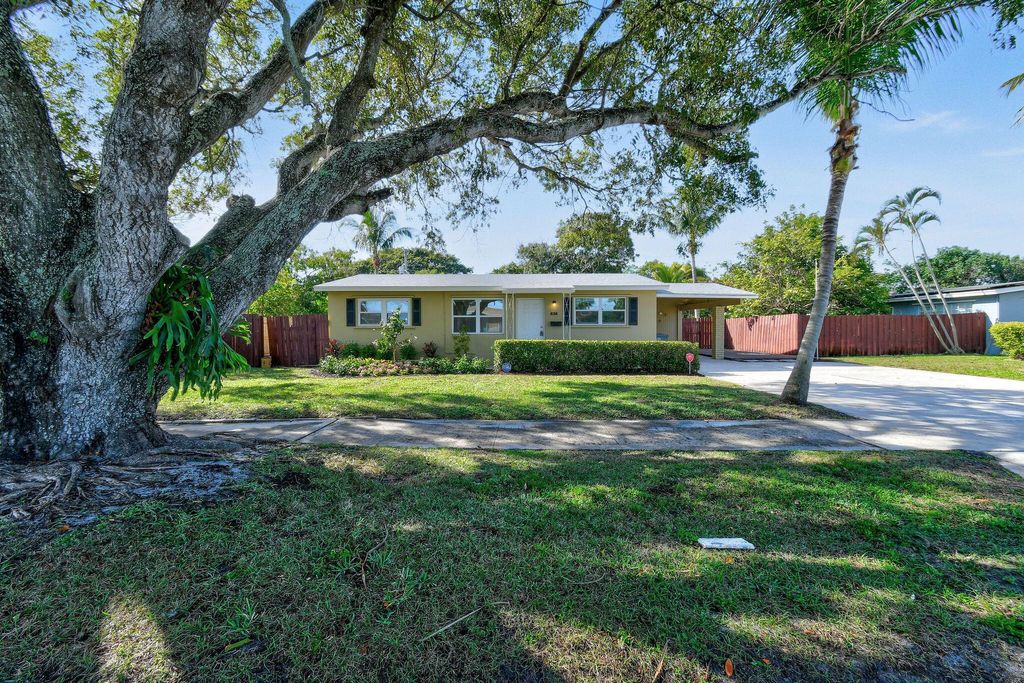 Photo of 836 Evergreen Drive, Lake Park, FL 33403 (MLS # R11068838)