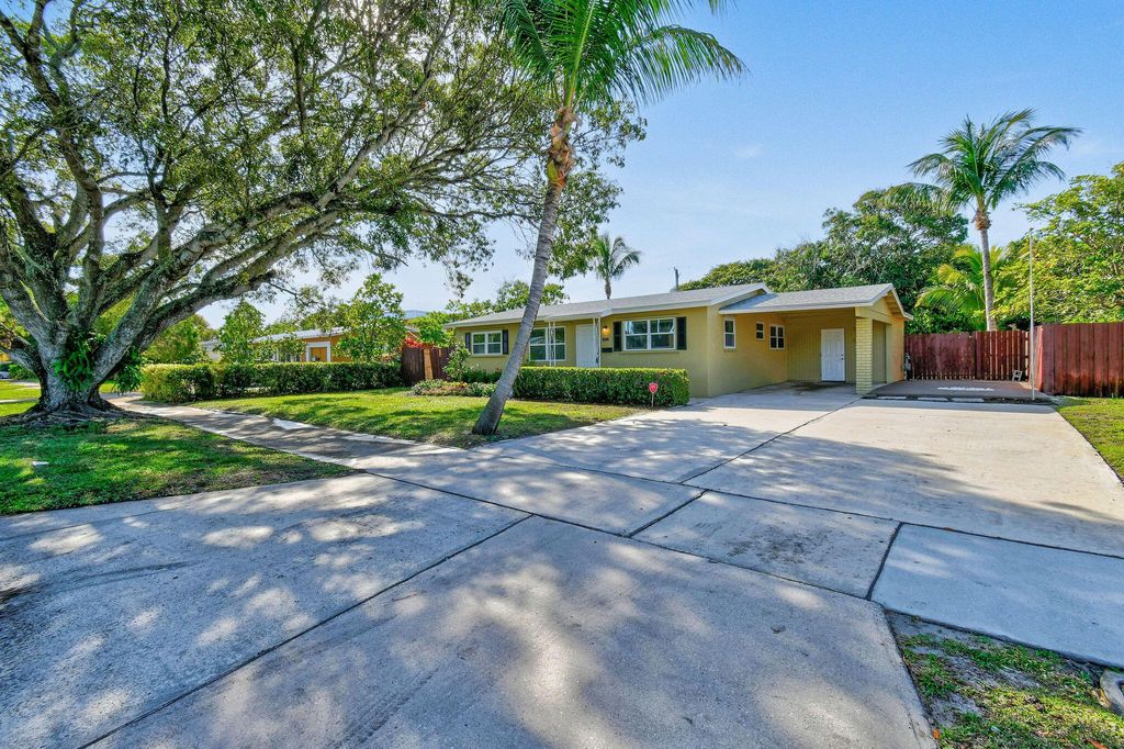 Photo of 836 Evergreen Drive, Lake Park, FL 33403 (MLS # R11068838)