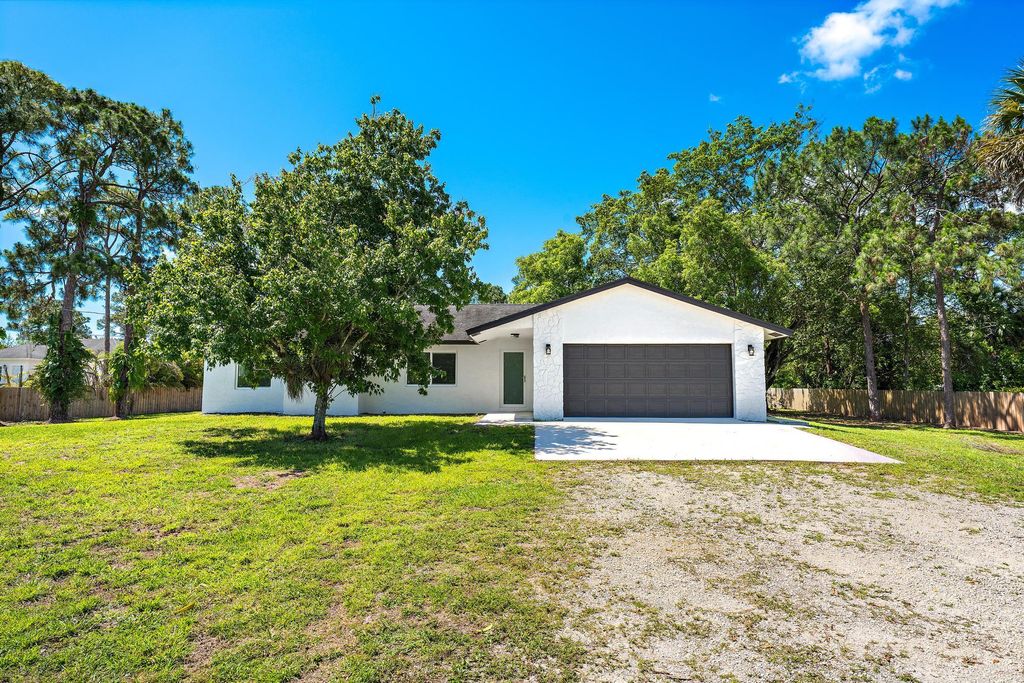 Photo of 11922 Orange Boulevard, The Acreage, FL 33412 (MLS # B26018966)