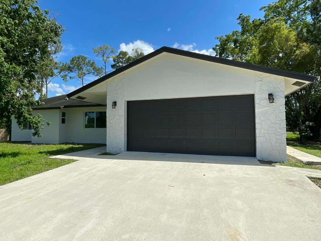 Photo of 11922 Orange Boulevard, The Acreage, FL 33412 (MLS # B26018966)