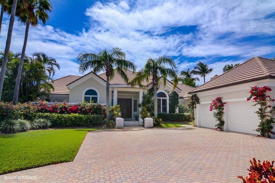 Sq Ft Per Floor Plan. Refined golf course home in private setting.  Living room boasts vaulted ceiling with wood paneling and 2 bars with solid mahogany tops.  Kitchen is a vision in white with spacious dining alcove, stainless appliances including gas cooktop  and marble counters.  Custom woodwork  including beautiful bookshelves with concealed Murphy bed in en-suite den/bedroom and wainscoting in formal dining room.  Master suite with mahogany flooring offers privacy and comfort with custom cabinetry affording ample storage, audio-visual compartments and morning kitchen with fridge.  Master bath is a true oasis featuring marble floor and countertops and deep pedestal soaking tub. Two en-suite guest rooms.  Lushly landscaped pool and patio offer privacy as well as golf and lake views.