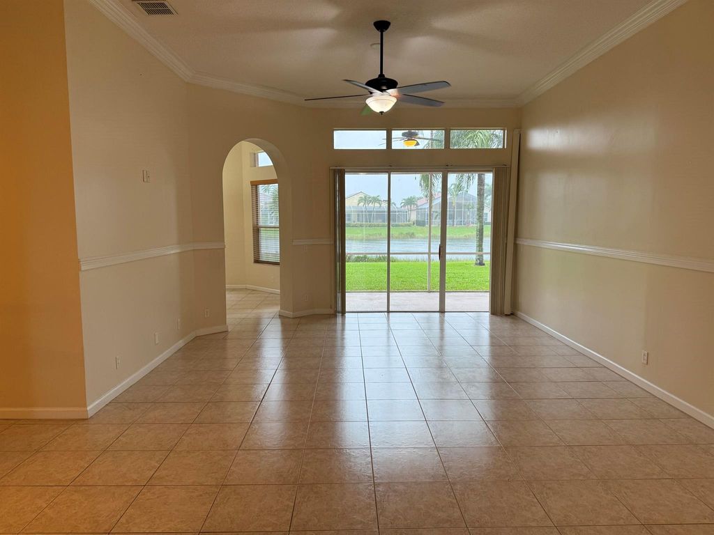 Photo of 137 NW Magnolia Lakes Boulevard, Port Saint Lucie, FL 34986 (MLS # R11024719)