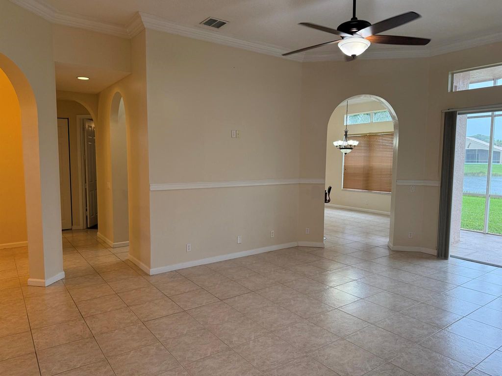 Photo of 137 NW Magnolia Lakes Boulevard, Port Saint Lucie, FL 34986 (MLS # R11024719)