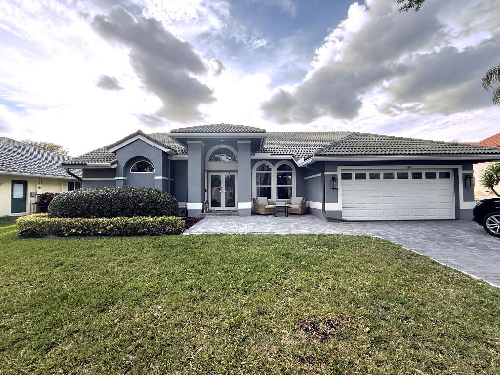 Photo of 4322 NW 62nd Avenue, Coral Springs, FL 33067 (MLS # B26006348)