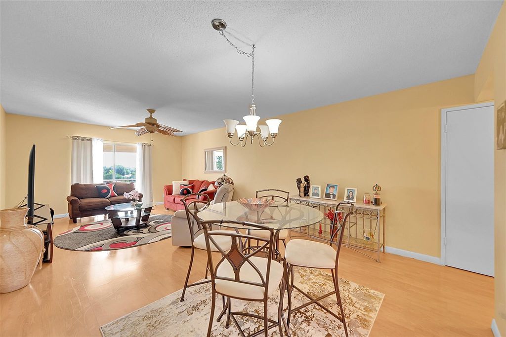 Photo of 3475 Broken Woods Drive #401, Coral Springs, FL 33065 (MLS # F10530347)
