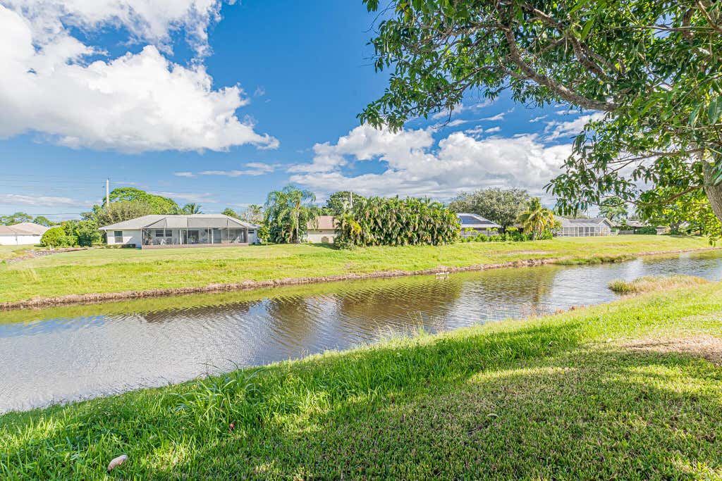 Photo of 409 SW Whitmore Drive, Port Saint Lucie, FL 34984 (MLS # R10976537)