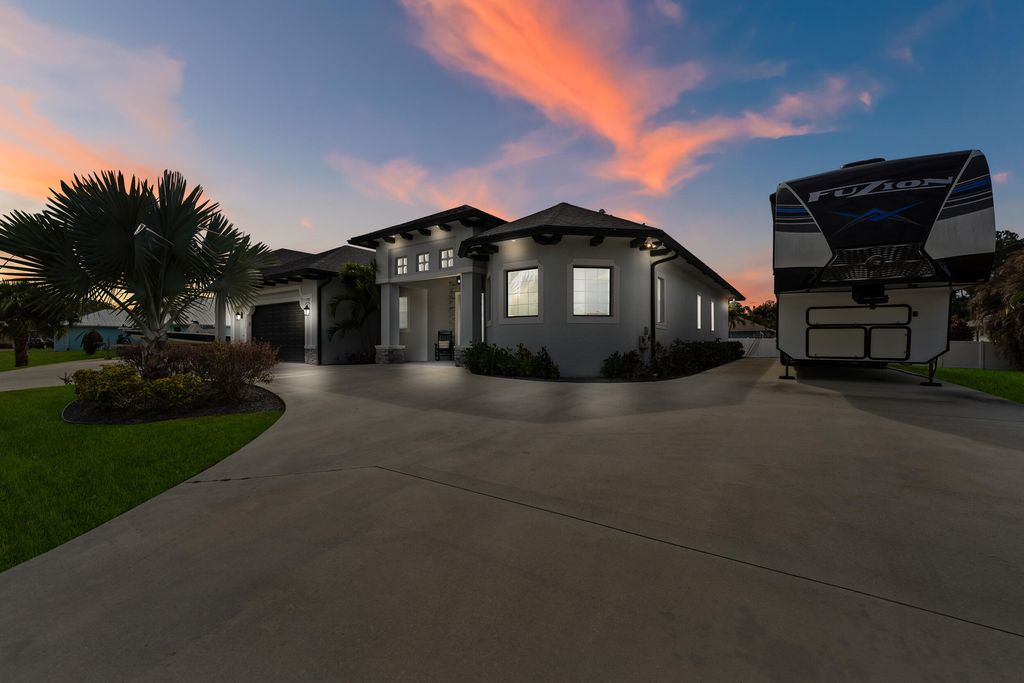 Photo of 2056 SW Aaron Lane, Port Saint Lucie, FL 34953 (MLS # R11162884)