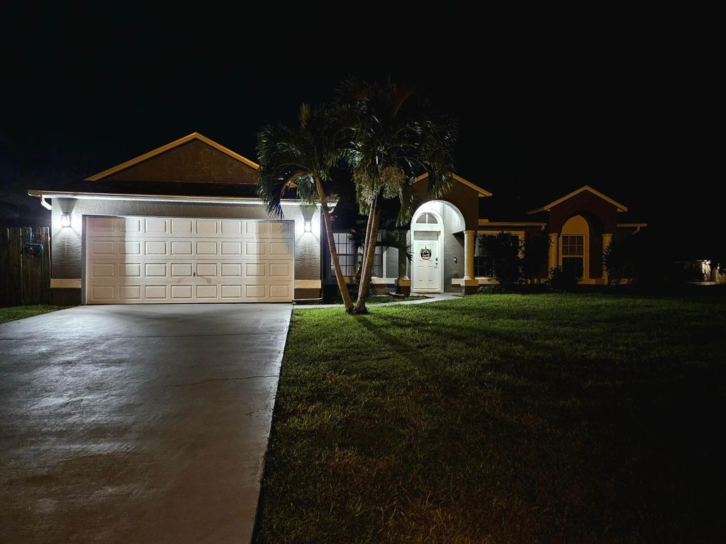 Photo of 1898 SW Penrose Avenue, Port Saint Lucie, FL 34953 (MLS # R11011122)