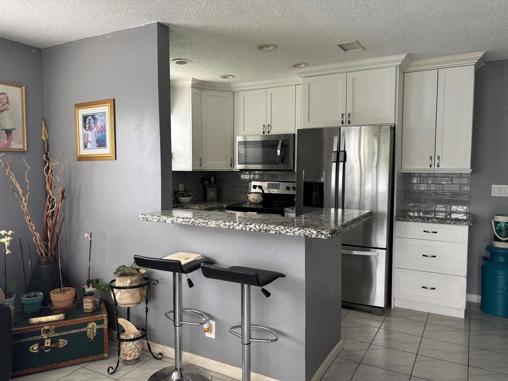 Photo of 287 Camden L #287, West Palm Beach, FL 33417 (MLS # R11132221)