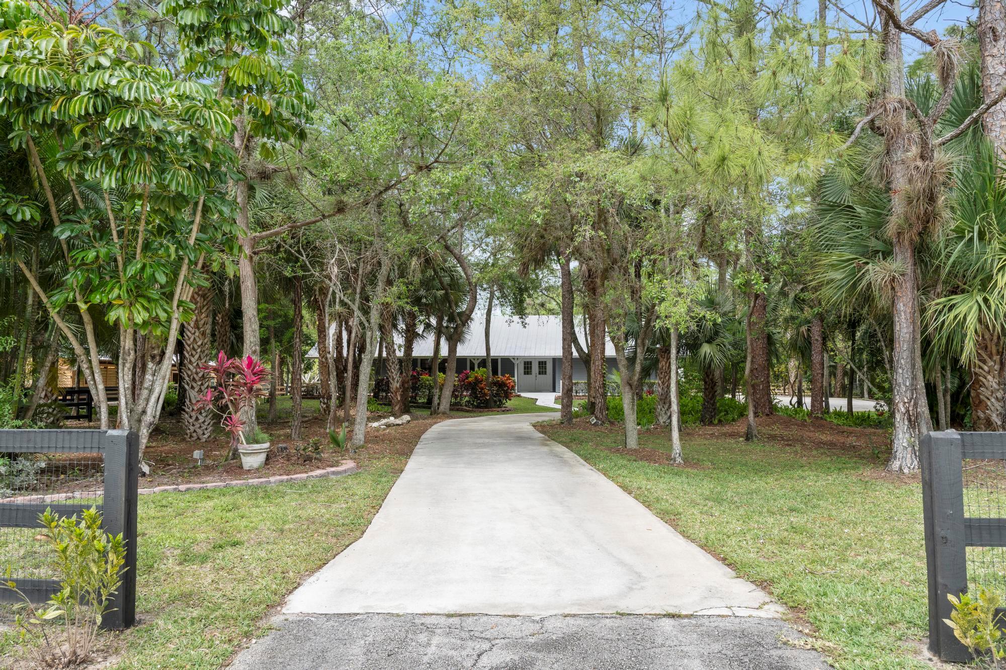 Experience the ultimate equestrian retreat with this turnkey Farm. This stunning property features a 4-bed, 3-bath pool home for your comfort and relaxation. It boasts an impressive brand new 8-stall barn complete with a tack room, feed room, office, 12x12 matted stalls with fans and a full bath. The equestrian amenities continue with two wash racks, a 200 x 100 irrigated arena and brand new paddocks providing ample turnout space for your horses. Features Impact windows throughout and metal roof. Located just minutes away from all equestrian venues and surrounded by horse trails, this property offers unparalleled convenience for horse enthusiasts.