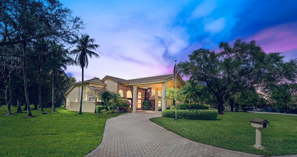 Photo of 3201 SW 134th Terrace, Davie, FL 33330 (MLS # B26003992)