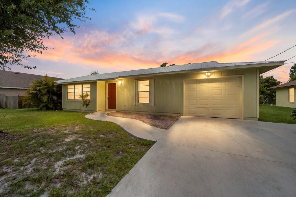Photo of 636 SW EYERLY Avenue, Port Saint Lucie, FL 34983 (MLS # B26056591)