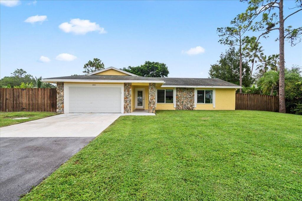 Photo of 15411 Los Angeles Drive, Loxahatchee Groves, FL 33470 (MLS # R10923174)