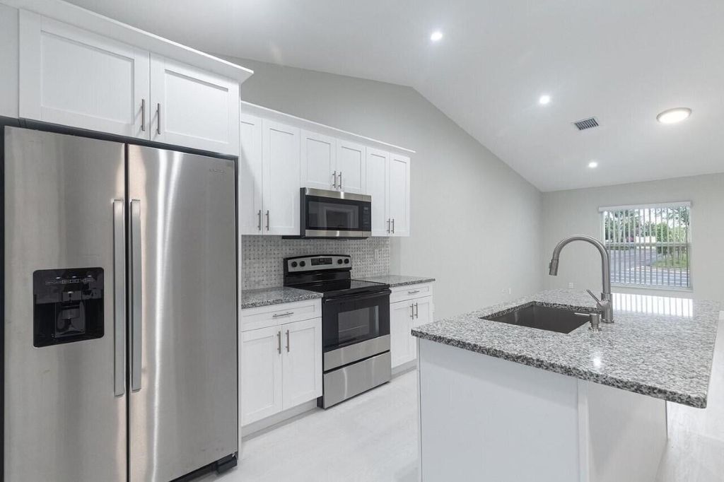 Photo of 3901 Gulfstream Road #7, Palm Springs, FL 33461 (MLS # R11109830)