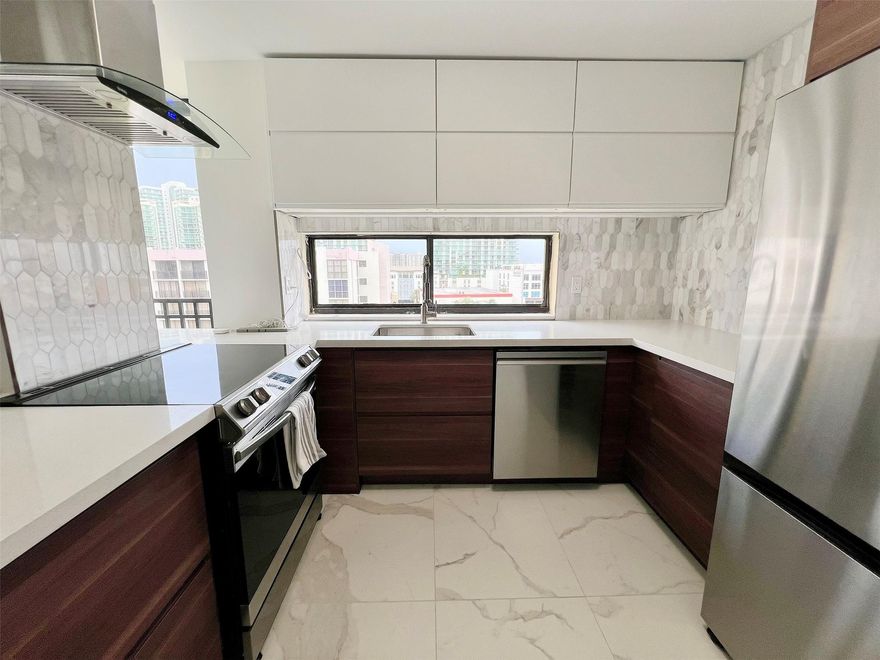 Location Location Location!!! Completely renovated 2/2 apartment. New tiles throughout, new kitchen, appliances, bathrooms, fans, doors, everything. Bright and airy unit in a quiet and well-maintained, gated community just a short walk from the ocean. Enjoy resort-style amenities: a huge heated pool, jacuzzi, sauna, gym, tennis courts, basketball court, library, party room, BBQ area, and 24/7 security. Conveniently located next to shopping plazas, restaurants, pharmacies, Milan's Supermarket, Starbucks, Marshalls, parks, A+ Schools and more. Just minutes from Aventura Mall and Bal Harbour Shops. Perfect as a primary residence, vacation home, or rental investment!