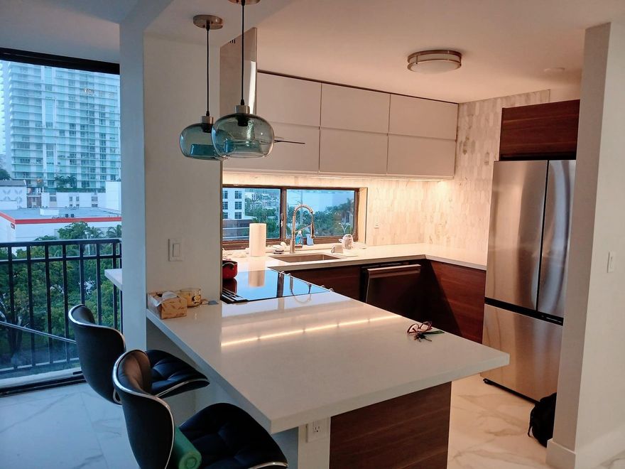 Location Location Location!!! Completely renovated 2/2 apartment. New tiles throughout, new kitchen, appliances, bathrooms, fans, doors, everything. Bright and airy unit in a quiet and well-maintained, gated community just a short walk from the ocean. Enjoy resort-style amenities: a huge heated pool, jacuzzi, sauna, gym, tennis courts, basketball court, library, party room, BBQ area, and 24/7 security. Conveniently located next to shopping plazas, restaurants, pharmacies, Milan's Supermarket, Starbucks, Marshalls, parks, A+ Schools and more. Just minutes from Aventura Mall and Bal Harbour Shops. Perfect as a primary residence, vacation home, or rental investment!