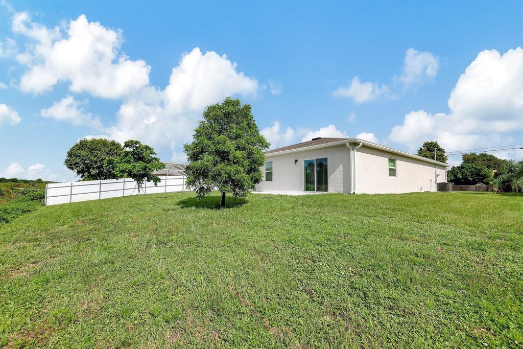 Photo of 1032 SW Abbot Avenue, Port Saint Lucie, FL 34953 (MLS # R11021015)