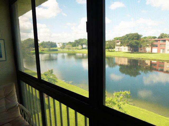 Available for either annual or seasonal rent, Bright, spacious tasteully furnished condo (the largest in the community) with lovely lake views. Updated with quartz, ss appliances, tile and nice laminate flooring. ENJOY the great views from the cozy enclosed lanai Very active, gated 55+ community with many clubs & activities. Pickleball & tennis. Free courtesy bus service. Located near a multitude of shops and restaurants. Minutes from the beach. Come experience the best of the Florida Lifestyle!!