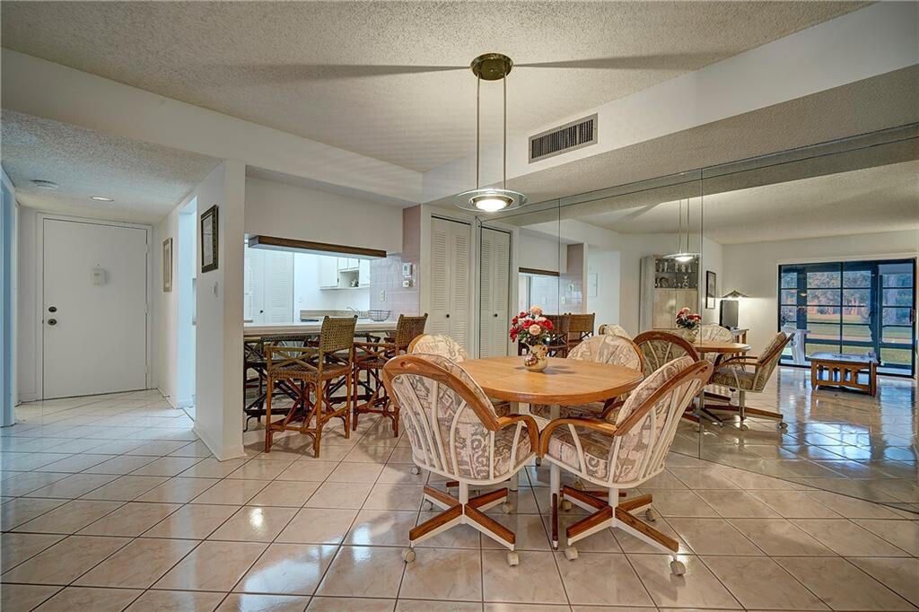 Photo of 15469 Lakes Of Delray Boulevard #102, Delray Beach, FL 33484 (MLS # B26028335)