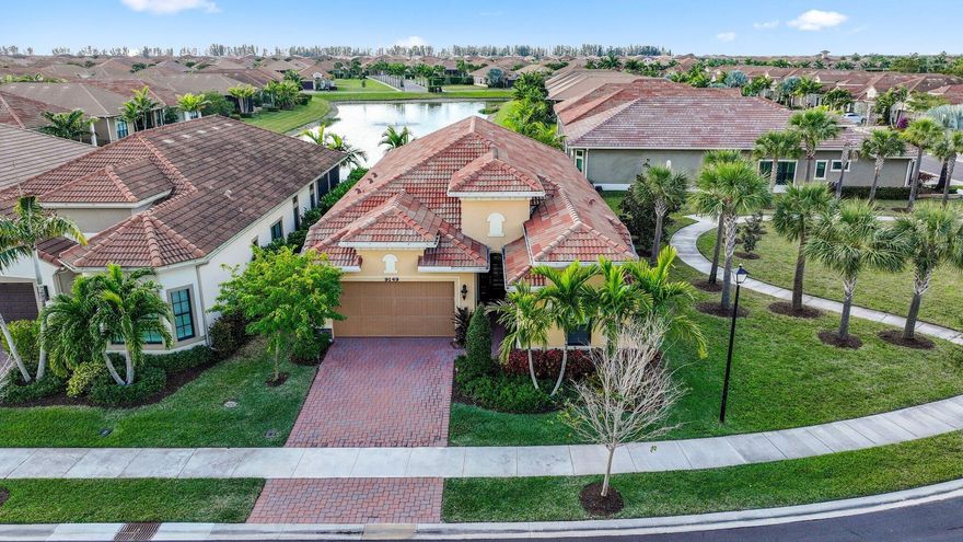 Discover the perfect blend of modern elegance and serene living at 9149 Leon Circle in Parkland, FL. This stunning home features 2 bedrooms and 3 bathrooms within 2,607 square feet of beautifully designed space. As you enter, you're immediately drawn to the fabulous long-range water view, complemented by wide open spaces and exquisite 36'' square white and grey marble porcelain flooring. The light and bright breakfast area offers a tranquil spot to start your day, with captivating views of the water. The gourmet kitchen is a chefs dream! Enjoy the privacy of an end lot with lush green space. The screened-in lanai provides a peaceful retreat, overlooking the water and its charming fountain. Situated on a 6,124 square foot lot, this home offers elegance and privacy in a picturesque setting.
