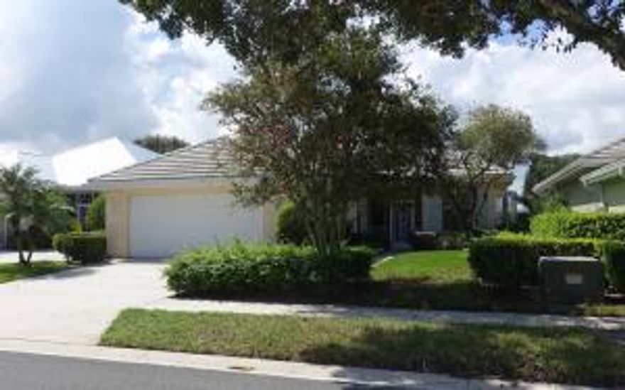A diamond in the rough! This is a DiVosta built ''Bedford'' pool home with a lake view located in the Meadows at Palm City, a gated and patrolled community. This unit needs extensive work.