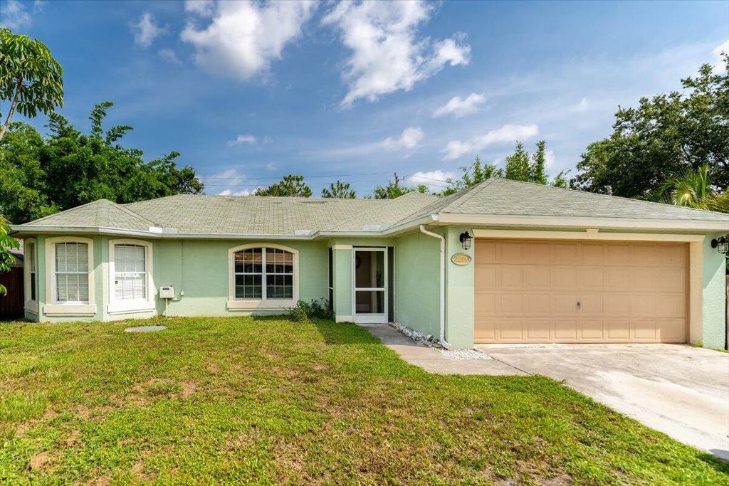 Photo of 2209 SW Edison Circle, Port St Lucie, FL 34953 (MLS # R10898572)