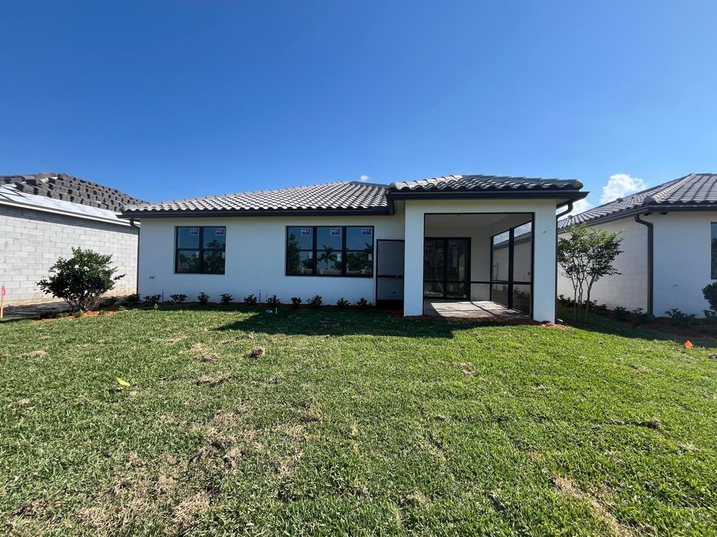 Photo of 885 SE Courances Dr #312, Port Saint Lucie, FL 34984 (MLS # R10976409)