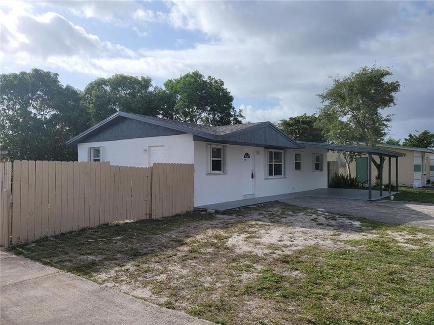 Beautiful 4 bed 2 bath single family home  Freshly painted in & out   Tile floors  newer Central AC  kitchen with S/S appliances and granite countertop.  & Spacious fenced green​​‌​​​​‌​‌​​​‌‌​​​‌‌‌​​‌​​‌‌​​​​ garden