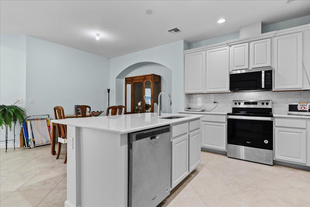 Photo of 12842 SW Lake Fern Circle, Port Saint Lucie, FL 34987 (MLS # B26020189)