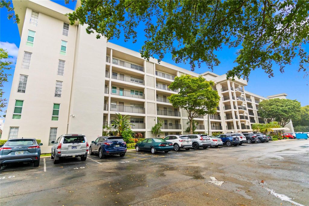 Photo of 3000 S Course Dr #607, Pompano Beach, FL 33069 (MLS # F10541903)