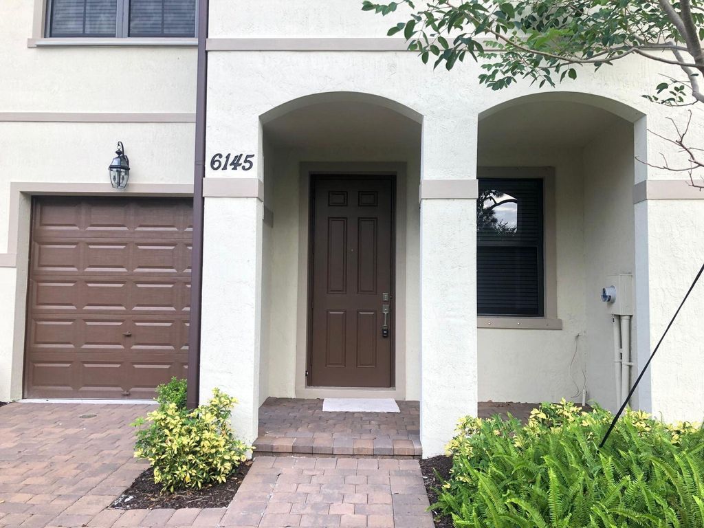 Photo of 6145 Bangalow Drive, Lake Worth, FL 33463 (MLS # R10977363)