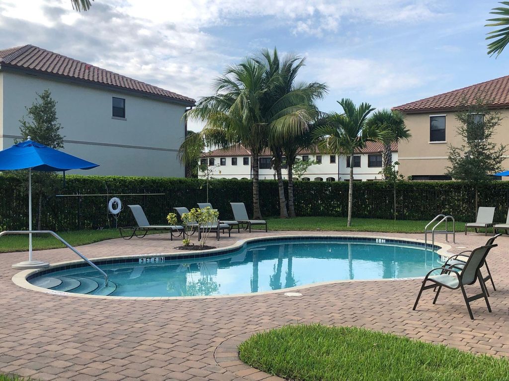 Photo of 6145 Bangalow Drive, Lake Worth, FL 33463 (MLS # R10977363)