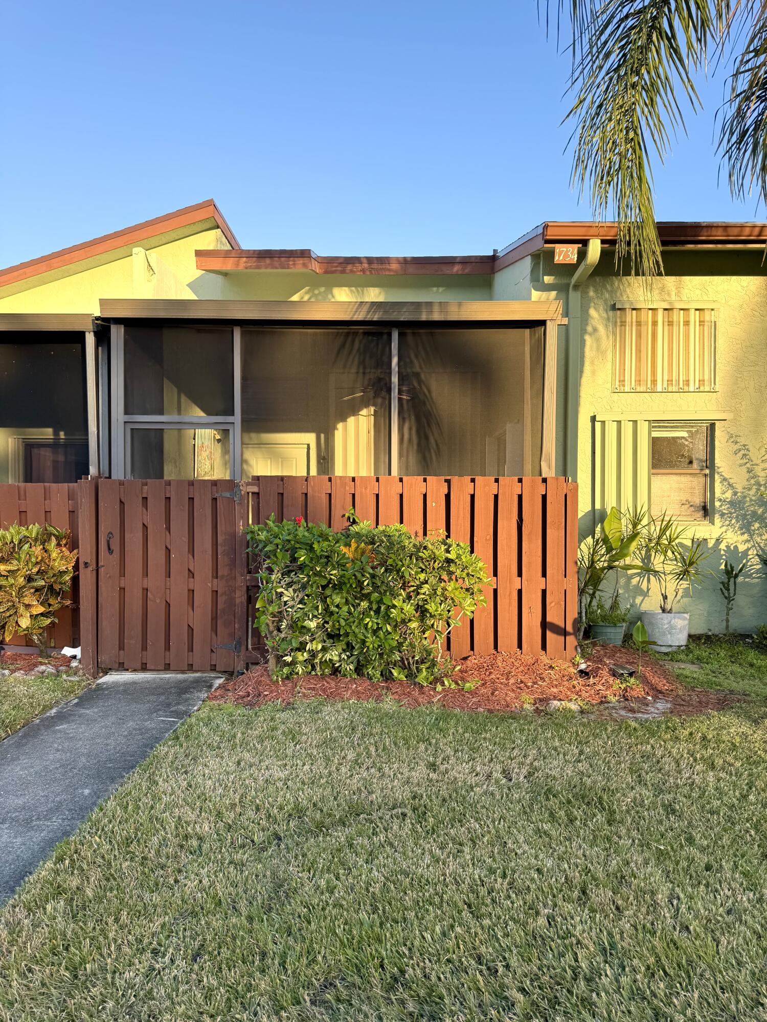 Charming 1 bed, 2 bath condo with loft in a quiet community. The spacious downstairs suite features a walk-in closet, double vanity & walk-in shower. Upstairs loft works great as a 2nd bedroom or office. Enjoy access to a heated pool, clubhouse, tennis courts & scenic lake. Rent includes cable, internet, water, sewer, trash & exterior insurance. Fresh paint & new flooring being installed. Close to shops, restaurants & beaches. Professional photos coming soon!