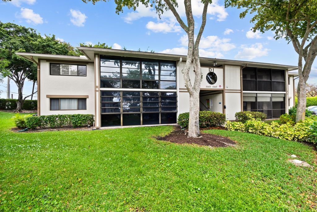 Photo of 10443 E Clairmont Circle #203, Tamarac, FL 33321 (MLS # B26013885)