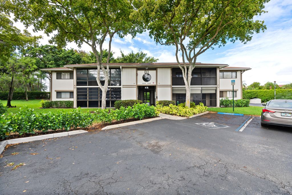 Photo of 10443 E Clairmont Circle #203, Tamarac, FL 33321 (MLS # B26013885)