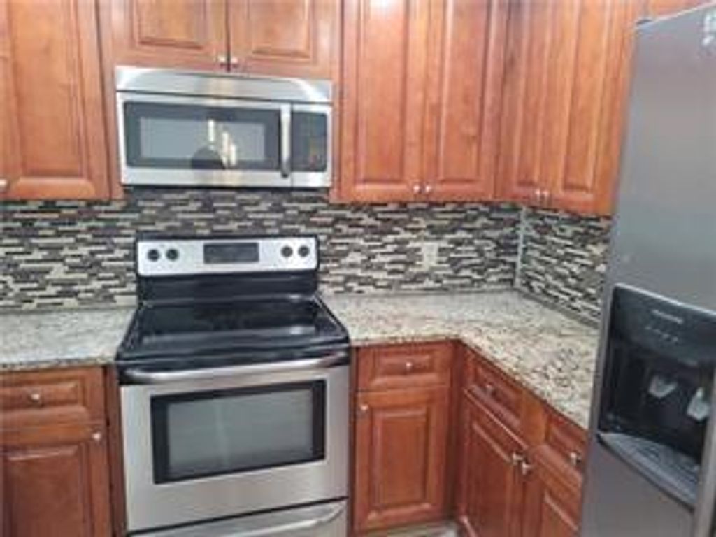 Photo of 11660 NW 45 Street #2, Coral Springs, FL 33065 (MLS # F10374320)