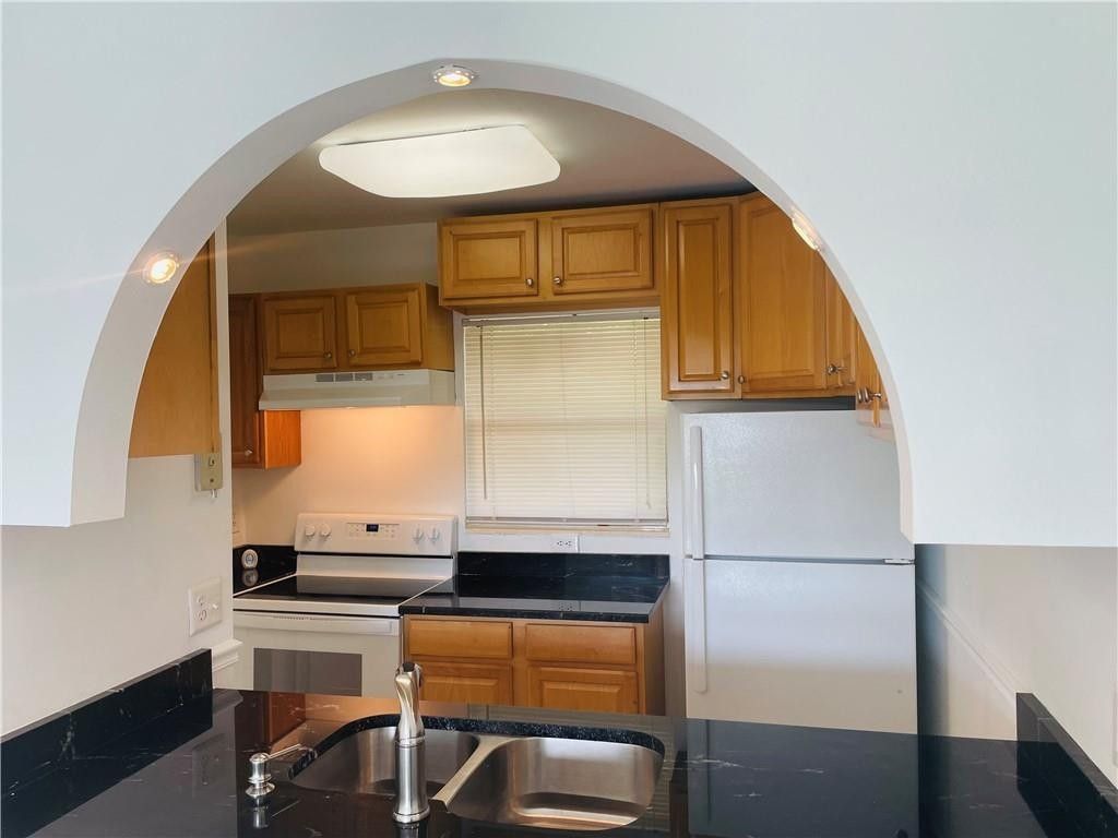 Photo of 3247 NW 103rd Te Ter #308-C, Coral Springs, FL 33065 (MLS # F10532352)
