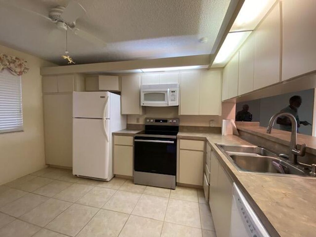 Photo of 2421 Village Boulevard #104, West Palm Beach, FL 33409 (MLS # R11048512)