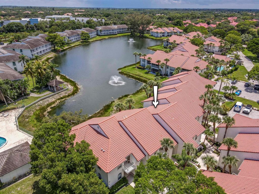 Photo of 106 Cypress Point Drive, Palm Beach Gardens, FL 33418 (MLS # R11106852)