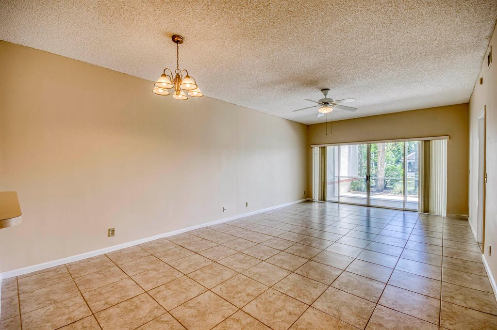 Photo of 106 Cypress Point Drive, Palm Beach Gardens, FL 33418 (MLS # R11106852)