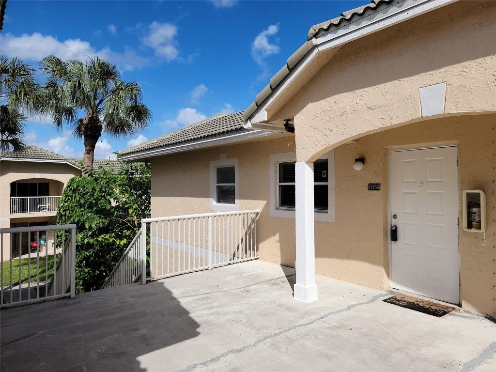 Photo of 12255 Royal Palm Bl Blvd #8-O, Coral Springs, FL 33065 (MLS # F10533790)