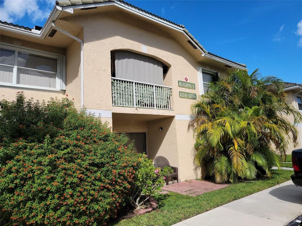 Photo of 12255 Royal Palm Bl Blvd #8-O, Coral Springs, FL 33065 (MLS # F10533790)