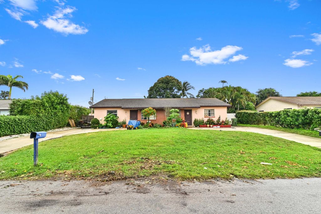 Photo of 3794 42nd Avenue S, Palm Springs, FL 33461 (MLS # R10966502)