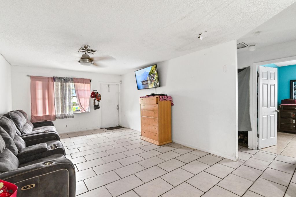 Photo of 3794 42nd Avenue S, Palm Springs, FL 33461 (MLS # R10966502)