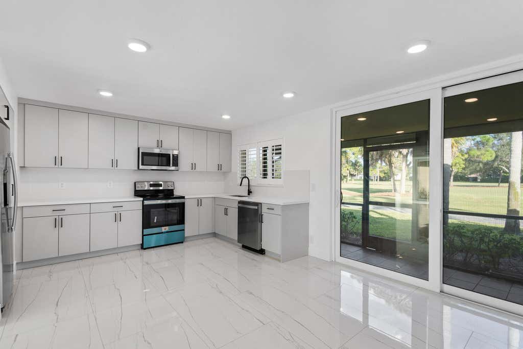 Photo of 215 Old Meadow Way, Palm Beach Gardens, FL 33418 (MLS # R10931954)