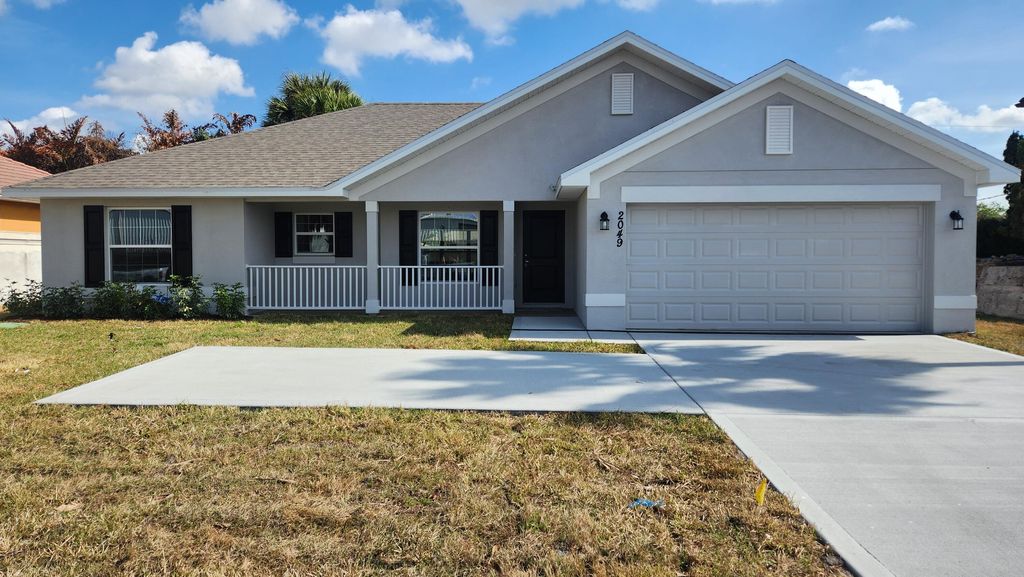 Photo of 2049 SW Bayshore Boulevard, Port Saint Lucie, FL 34984 (MLS # R11137575)