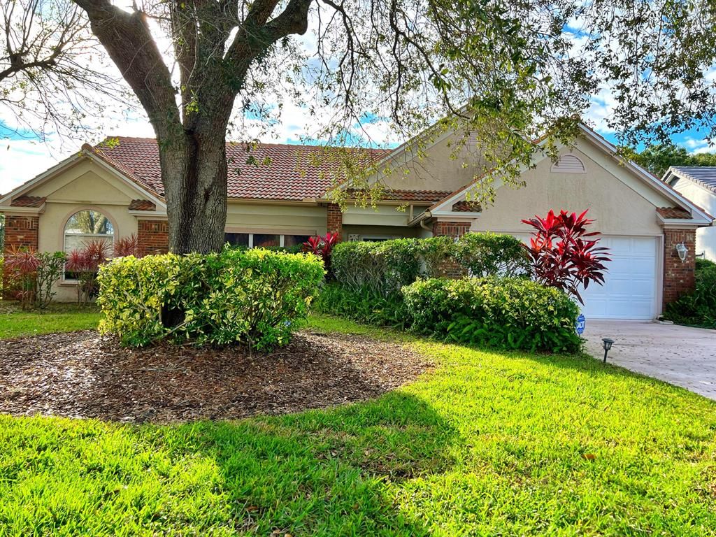 Photo of 408 SW Sycamore Drive, Port St Lucie, FL 34986 (MLS # R10851653)