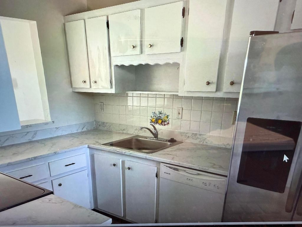 Photo of 5403 SE Miles Grant Road, Stuart, FL 34997 (MLS # B26012178)