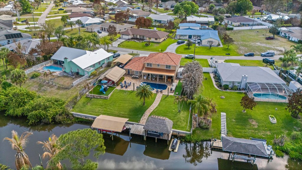 Photo of 121 NE Naranja Avenue, Port Saint Lucie, FL 34983 (MLS # B26016858)