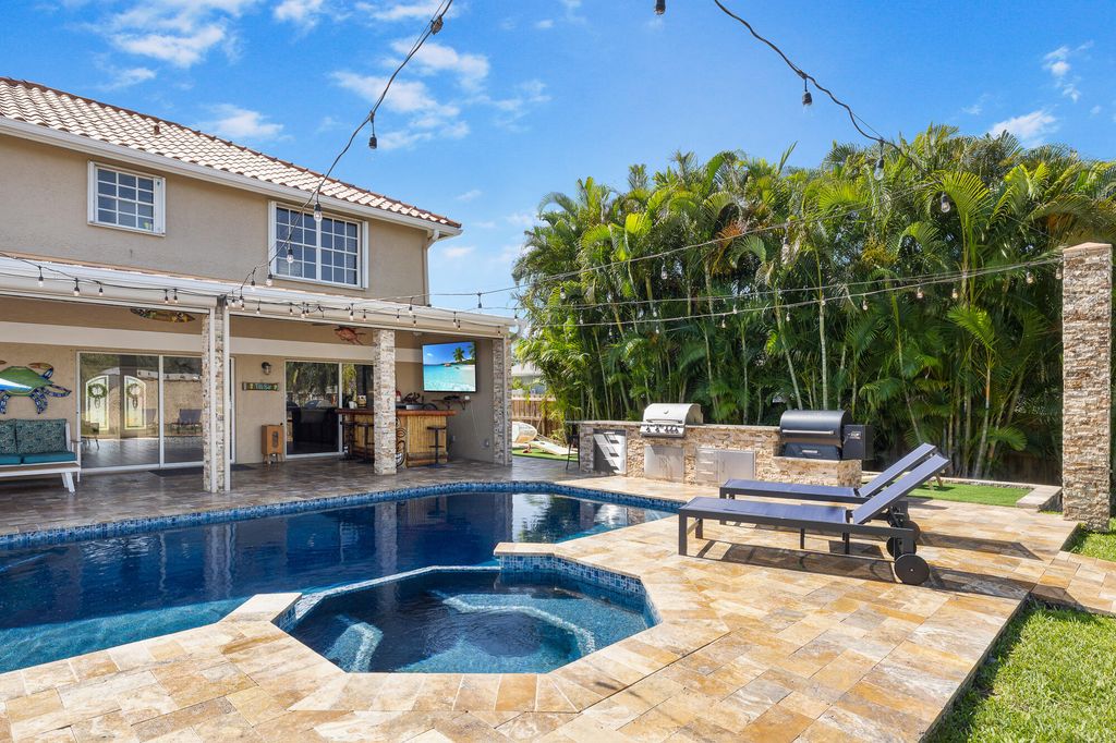 Photo of 121 NE Naranja Avenue, Port Saint Lucie, FL 34983 (MLS # B26016858)